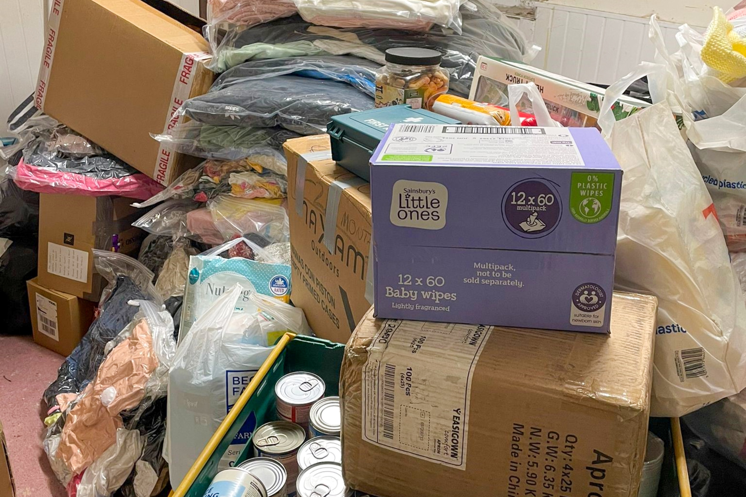 Several crate loads of non-perishable foods, baby supplies and other essentials collected by the team at Healthcare Management Solutions for Ukrainian refugees.