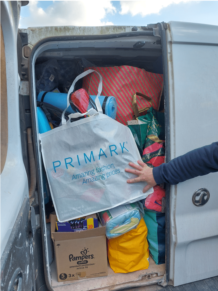 A small van full to the brim with items donated by the team at Healthcare Management Solutions for Tom and Sam's humanitarian mission for Ukrainian refugees.